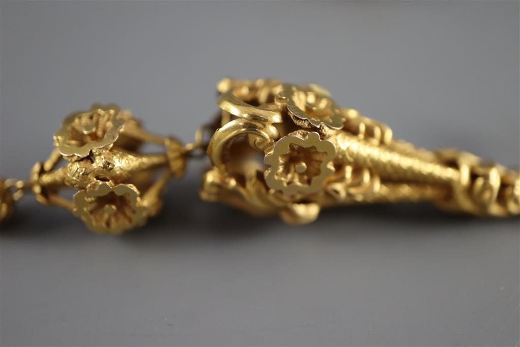 A pair of Victorian gold (tests as 18ct) pendeloque earrings, the suspensions marked as 9ct,